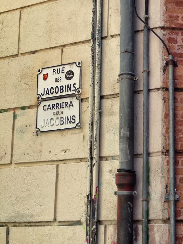 Street signs in French and Occitan